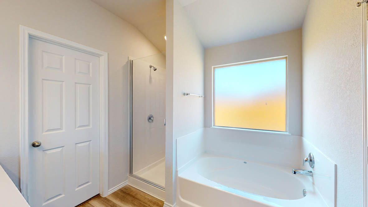 246 Water Wl Road Burnet, TX 78611 - Photo 8 of 16 a bathroom with a bathtub and shower