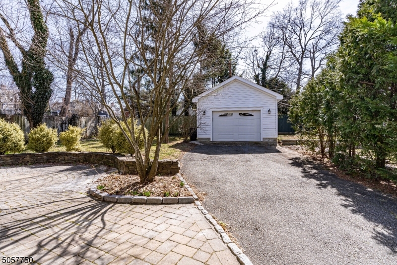 12 Wetmore Avenue, Unit 1 Morristown, NJ 07960 - Photo 20 of 26 a front view of a house with a yard