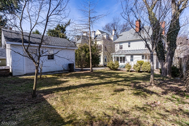 12 Wetmore Avenue, Unit 1 Morristown, NJ 07960 - Photo 22 of 26 a front view of a house with a yard