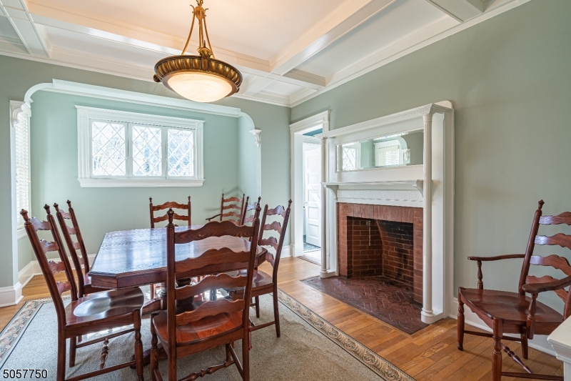 12 Wetmore Avenue, Unit 1 Morristown, NJ 07960 - Photo 5 of 26 a view of a dining room with furniture window and wooden floor