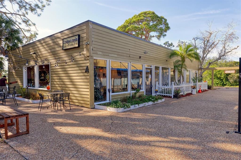 4513 Morningside, Unit 4 Sarasota, FL 34235 - Photo 43 of 81 a view of a house with a patio