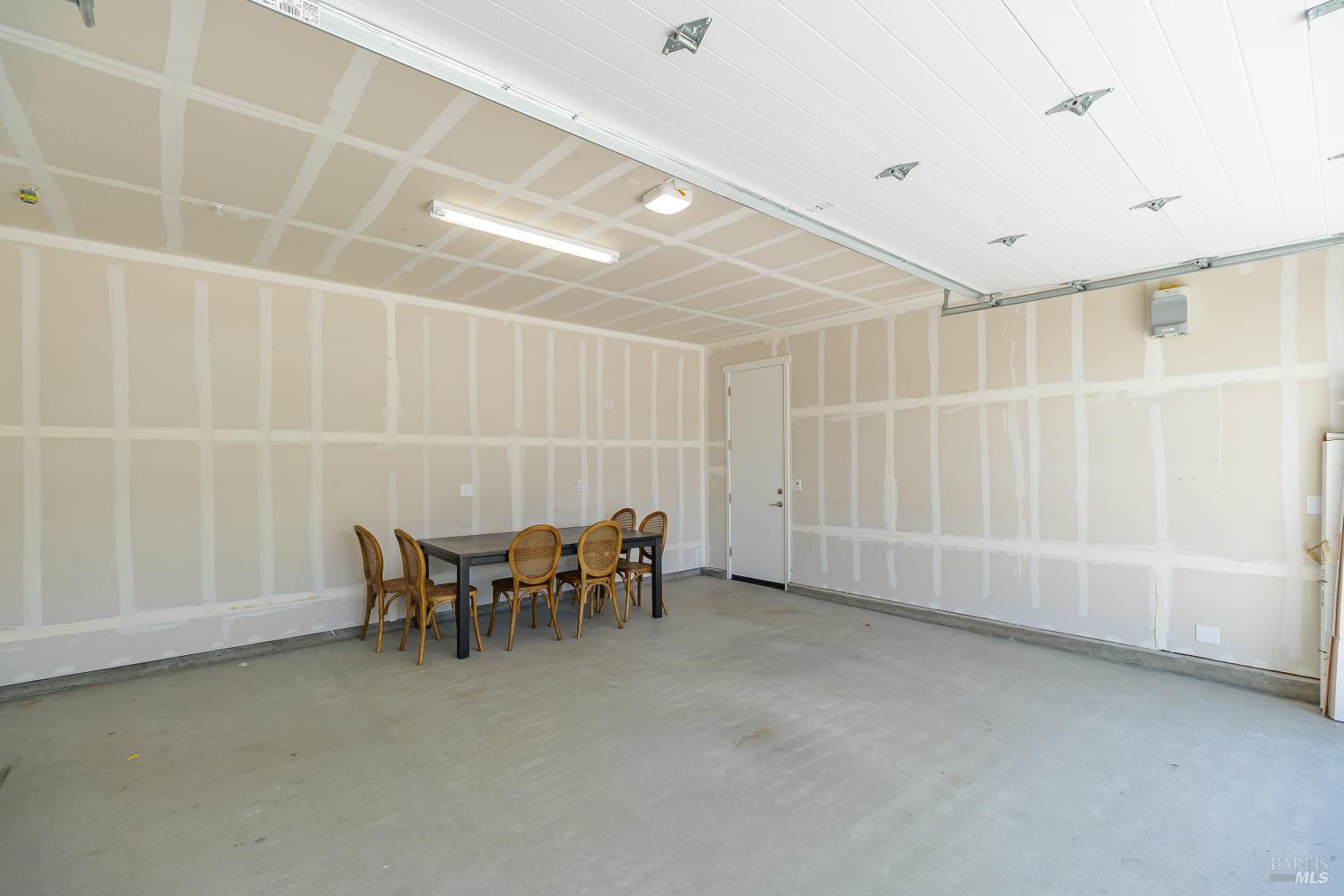 1201 Del Rancho Way Petaluma, CA 94954 - Photo 37 of 56 a view of a room with table and chairs