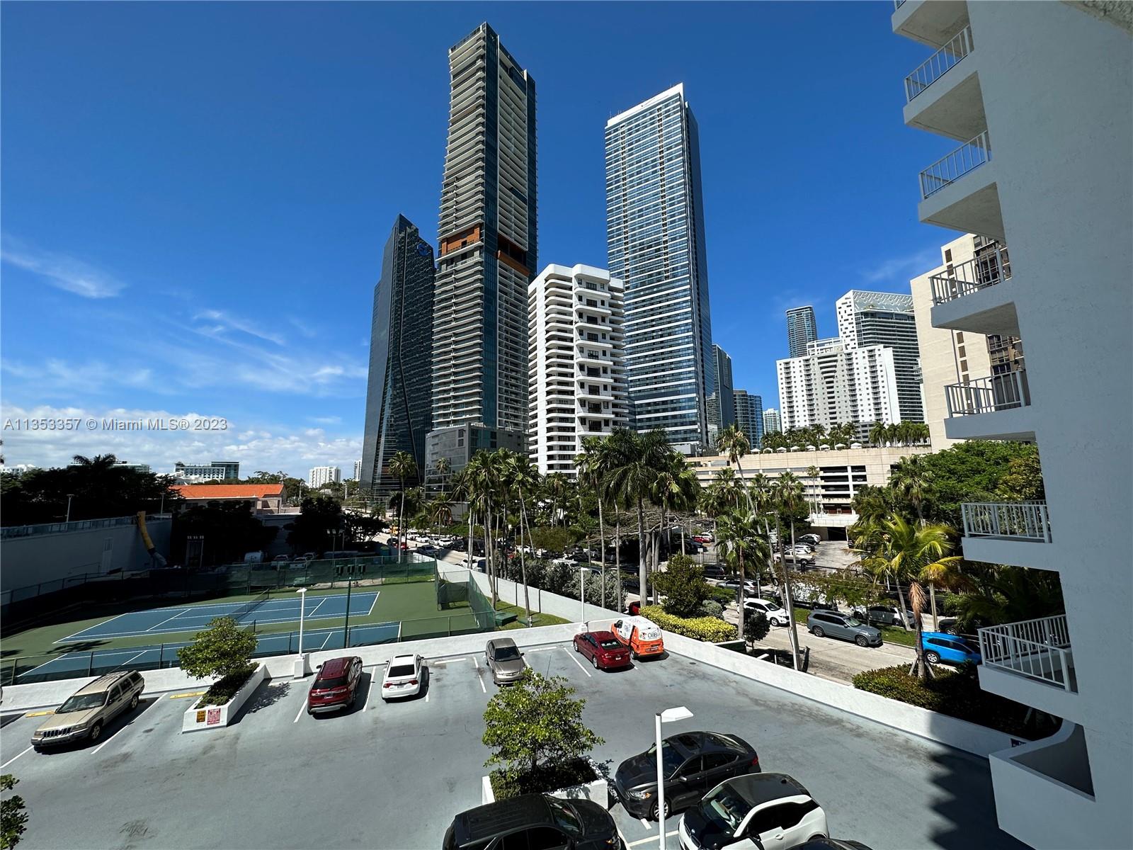 200 Southeast 15th Road, Unit 5J Miami, FL 33129 - Photo 12 of 20 a front view of a building with street view