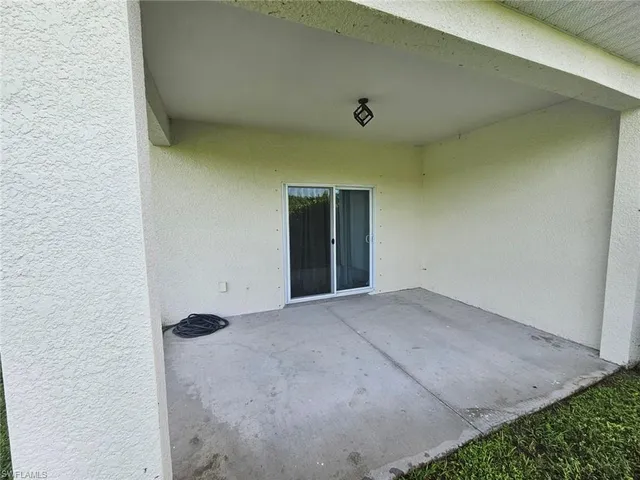 a view of a garden with an outdoor space