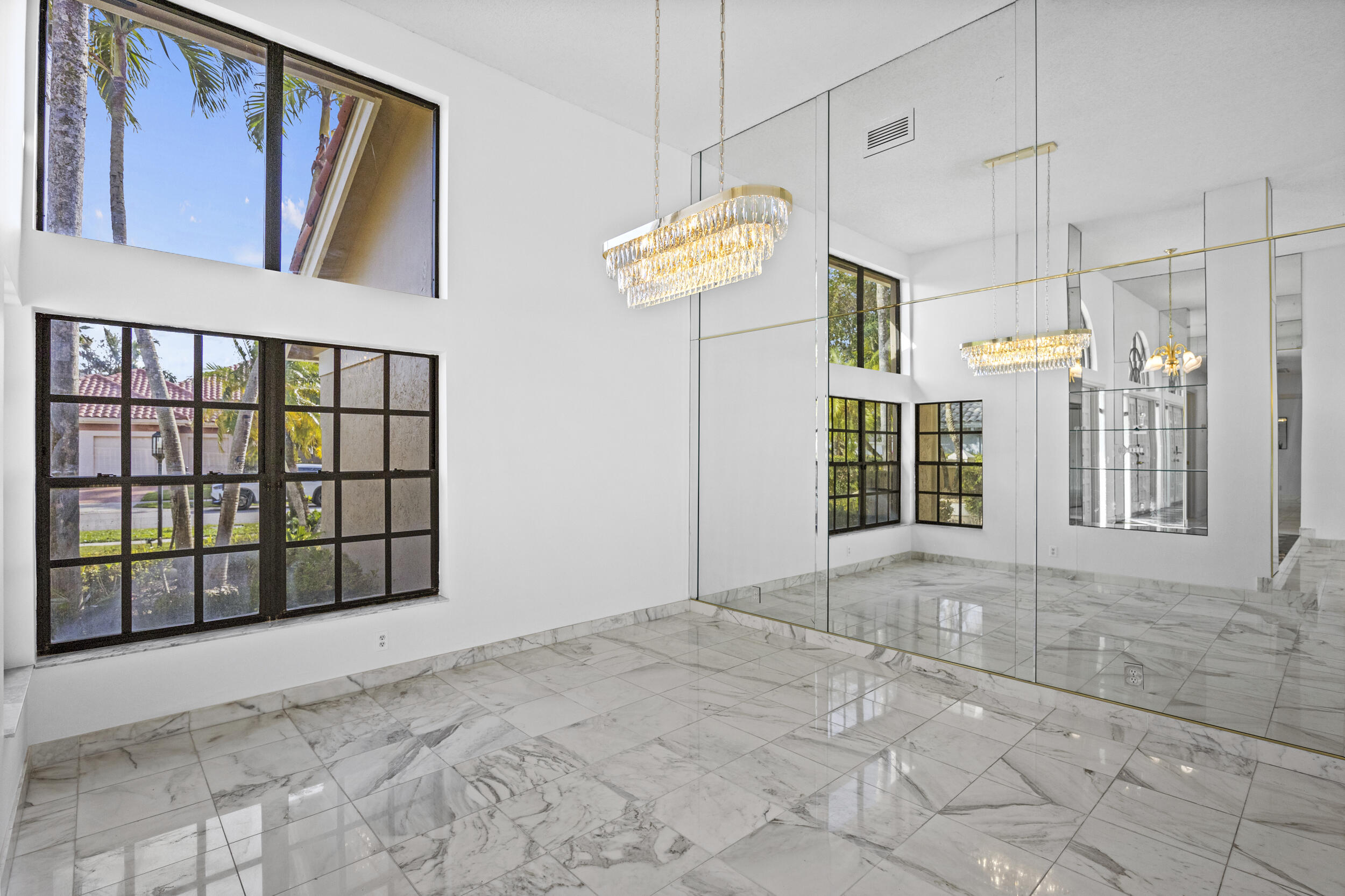 10747 Stonebridge Boulevard Boca Raton, FL 33498 - Photo 19 of 81 a view of an empty room with a window