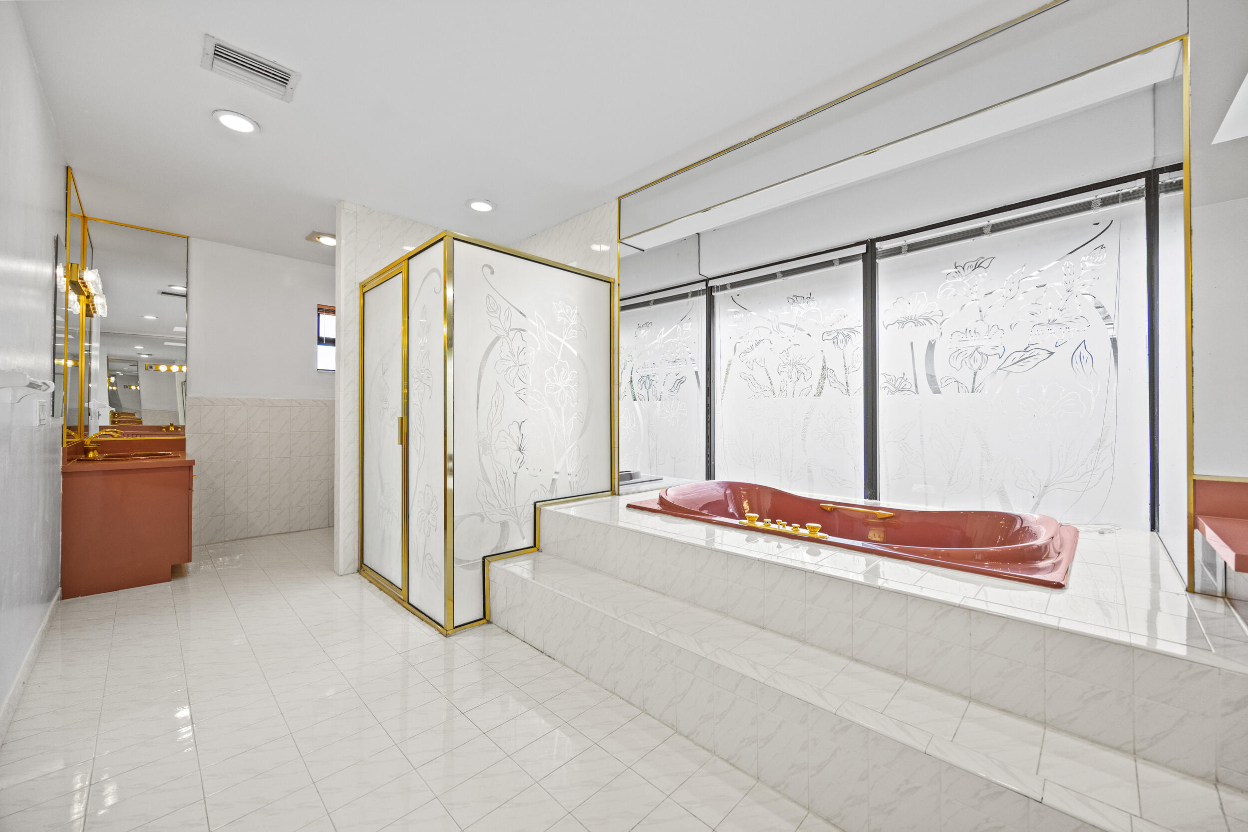 10747 Stonebridge Boulevard Boca Raton, FL 33498 - Photo 43 of 81 a spacious bedroom with a large bed and a large window