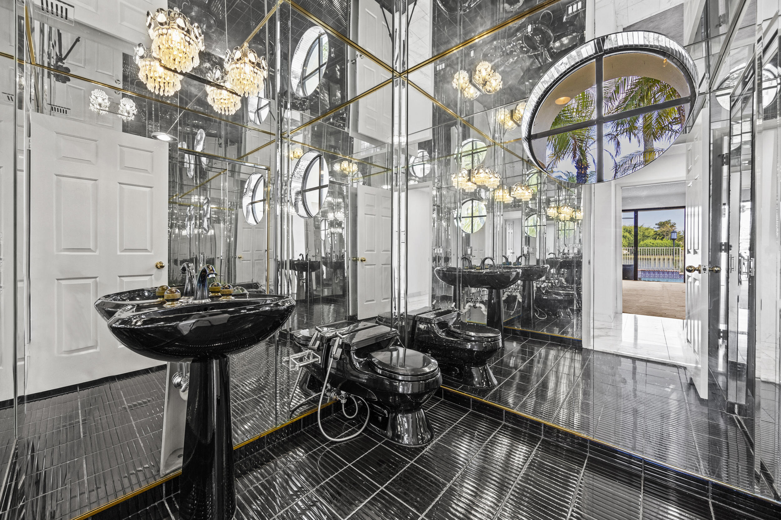 10747 Stonebridge Boulevard Boca Raton, FL 33498 - Photo 45 of 81 a bathroom with a sink and a mirror