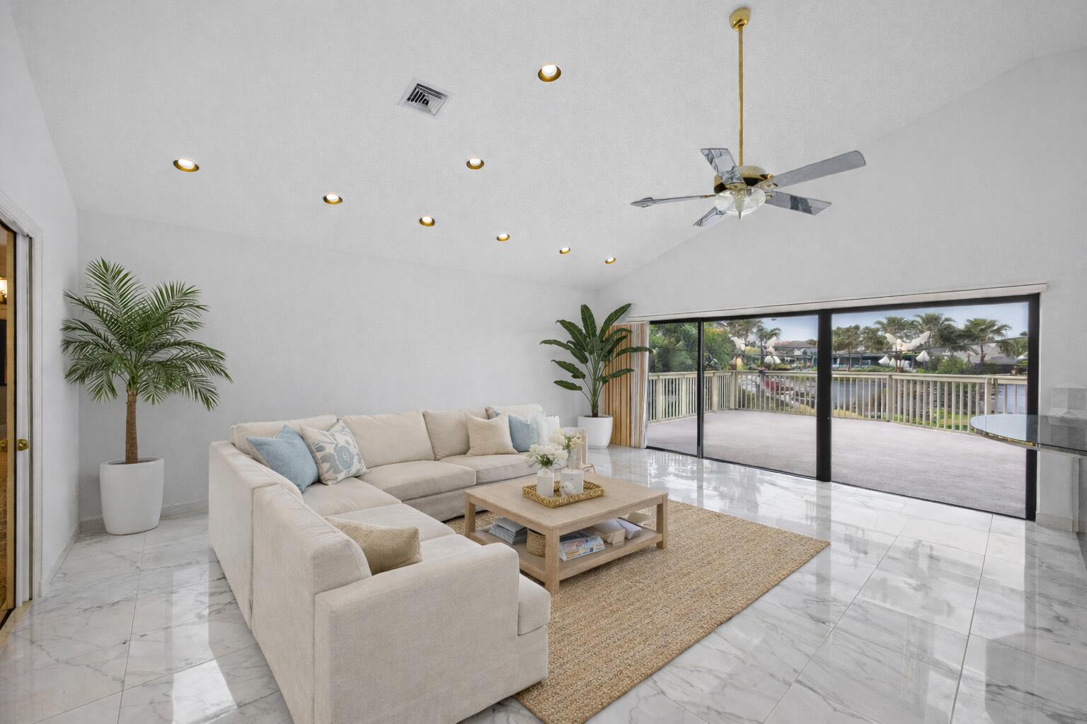 10747 Stonebridge Boulevard Boca Raton, FL 33498 - Photo 6 of 81 a living room with furniture