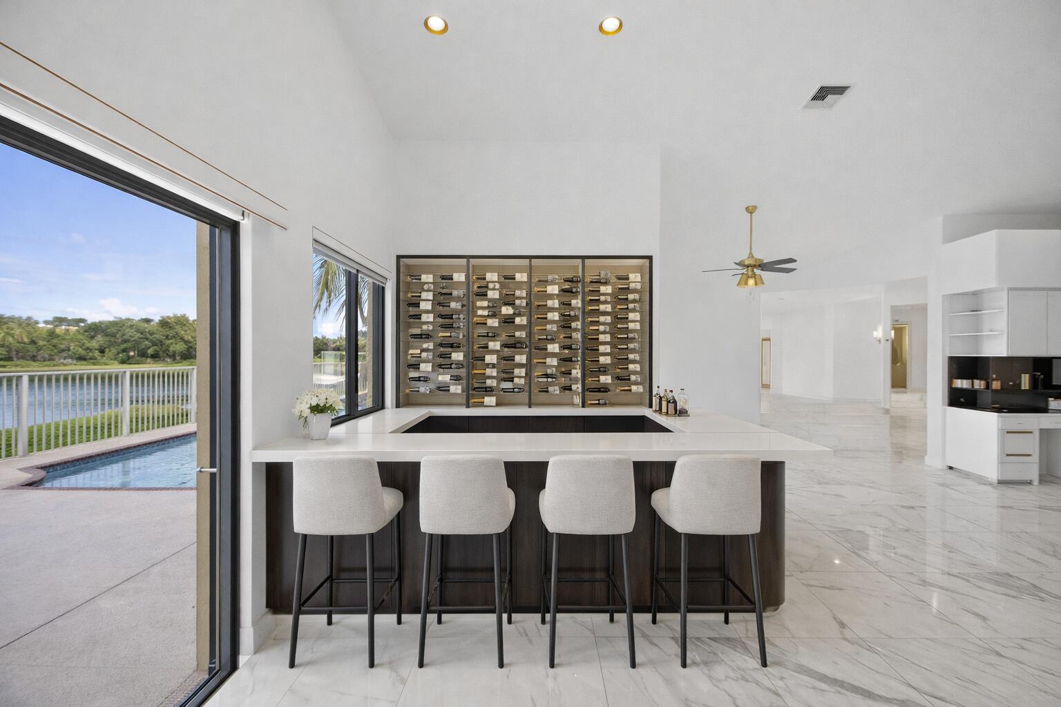 10747 Stonebridge Boulevard Boca Raton, FL 33498 - Photo 7 of 81 a view of a dining room with furniture window and wooden floor