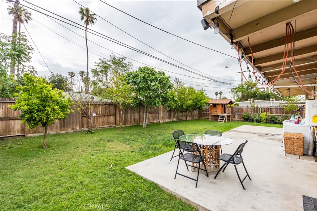 6688 Phoenix Avenue Riverside, CA 92504 - Photo 25 of 26 a view of a backyard with sitting area furniture and garden