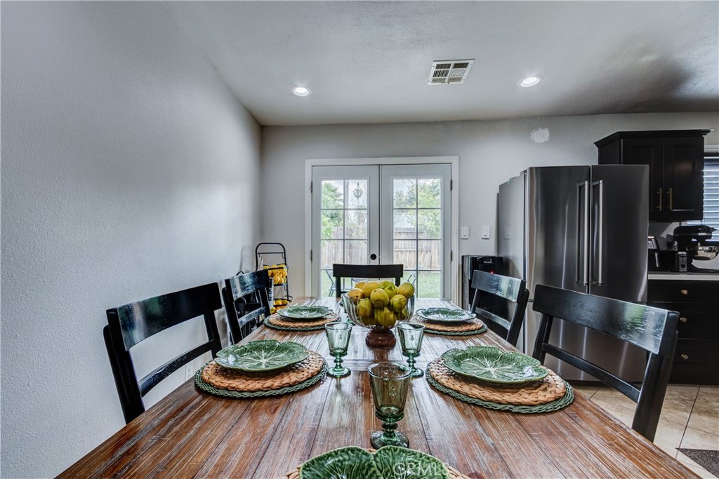 6688 Phoenix Avenue Riverside, CA 92504 - Photo 6 of 26 a kitchen with a refrigerator and a stove