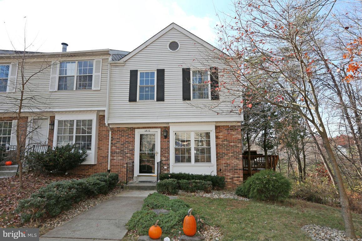 a front view of a house with porch