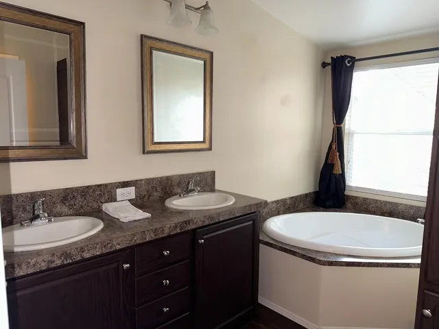 an empty room with wooden floor