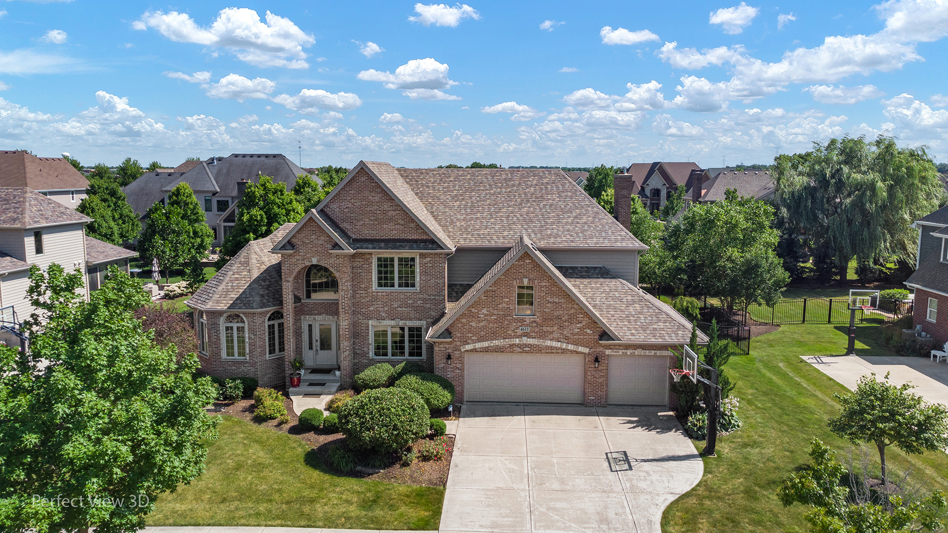4611 Corktree Road Naperville, IL 60564 - Photo 1 of 20 a front view of a house with garden