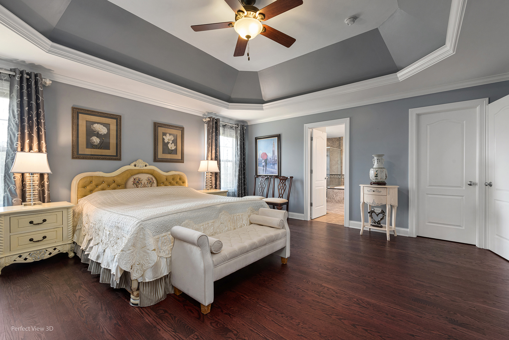 4611 Corktree Road Naperville, IL 60564 - Photo 11 of 20 a spacious bedroom with a large bed chandelier and a window