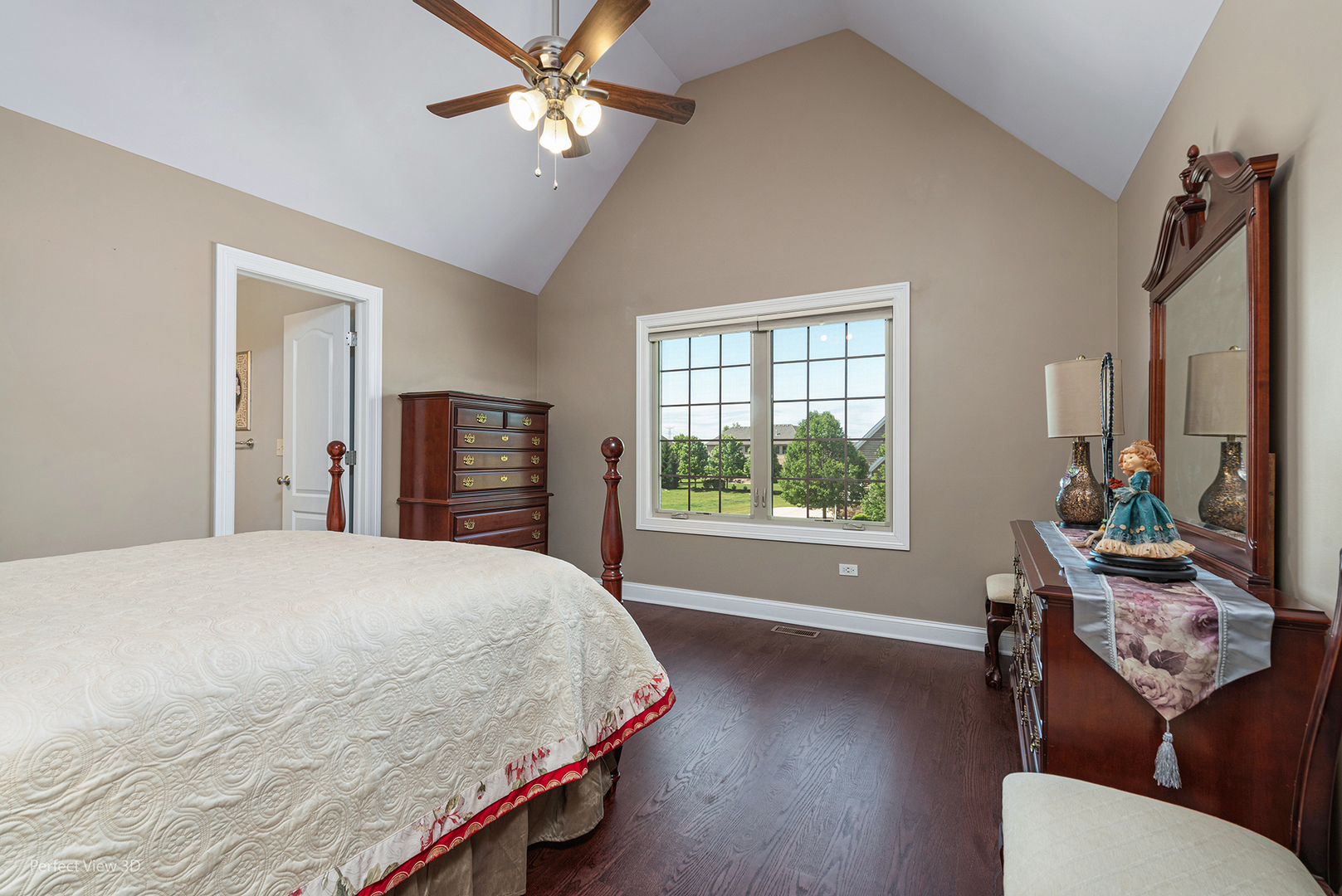 4611 Corktree Road Naperville, IL 60564 - Photo 13 of 20 a bedroom with a bed dresser and a window
