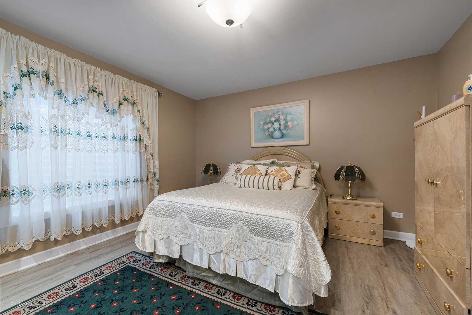 4611 Corktree Road Naperville, IL 60564 - Photo 15 of 20 a bedroom with a bed and a window