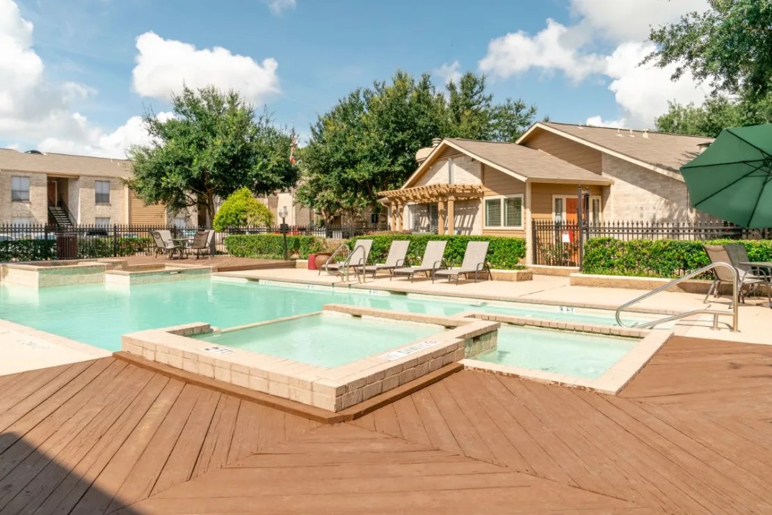 515 South Bender Avenue, Unit 2008 Humble, TX 77338 - Photo 12 of 17 a view of a house with swimming pool and a outdoor space