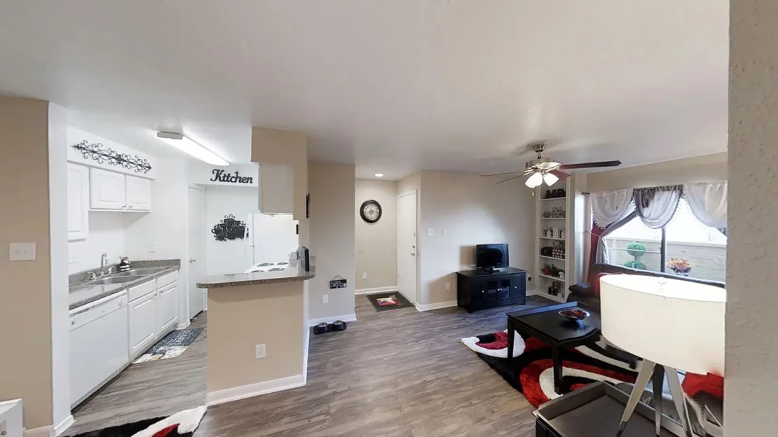 515 South Bender Avenue, Unit 2008 Humble, TX 77338 - Photo 15 of 17 a kitchen with a refrigerator and a sink