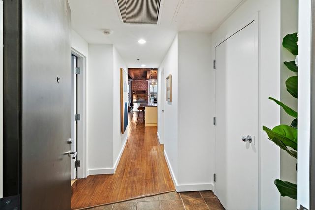 wooden floor with closet