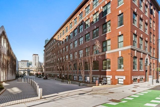 a city street lined with tall buildings