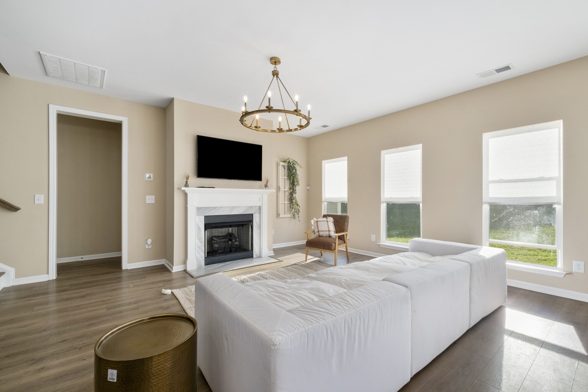 426 Butler Road Mount Juliet, TN 37122 - Photo 11 of 41 a spacious bedroom with a bed and a fireplace