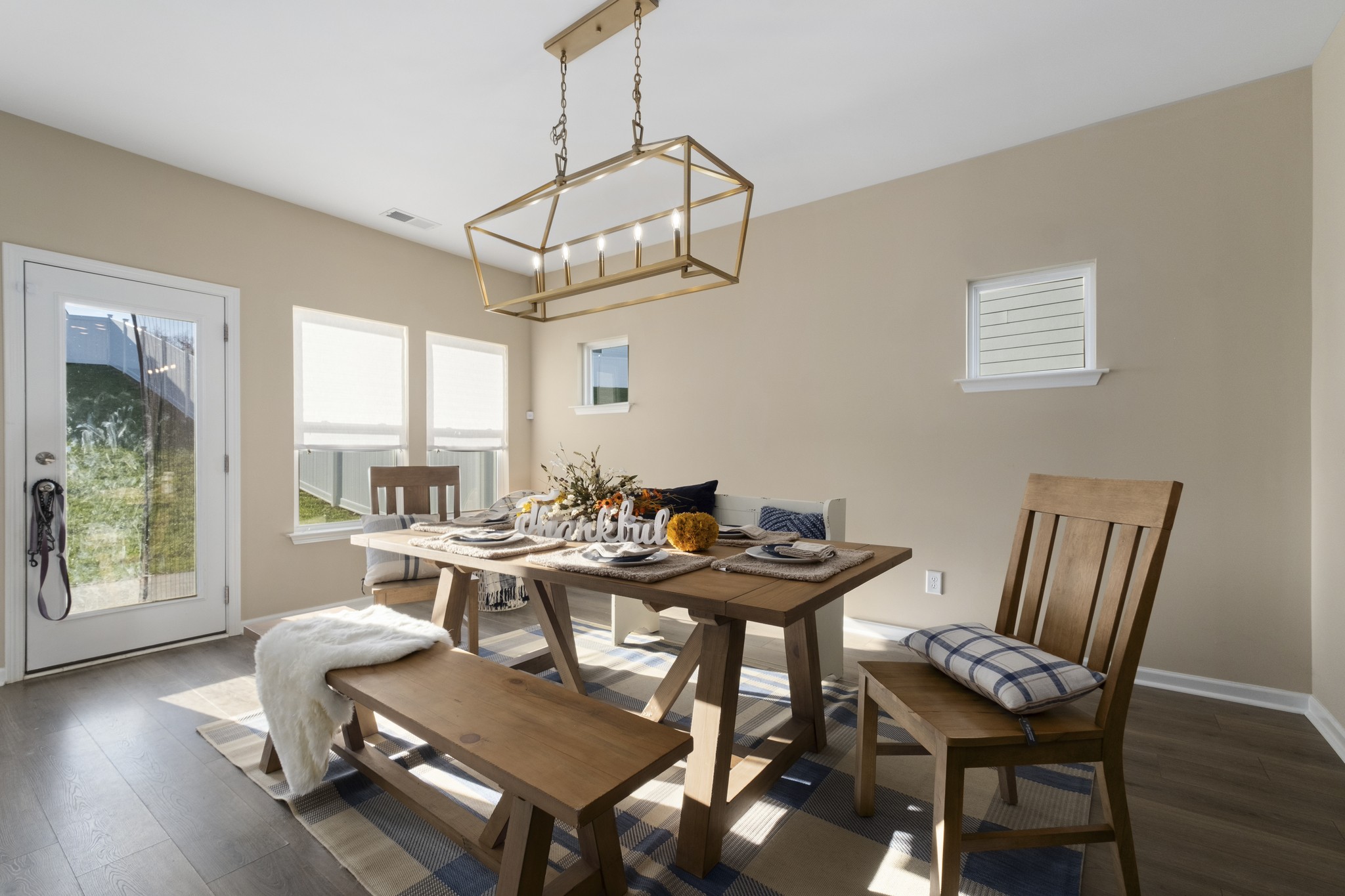 426 Butler Road Mount Juliet, TN 37122 - Photo 16 of 41 a view of a dining room with furniture wooden floor and chandelier