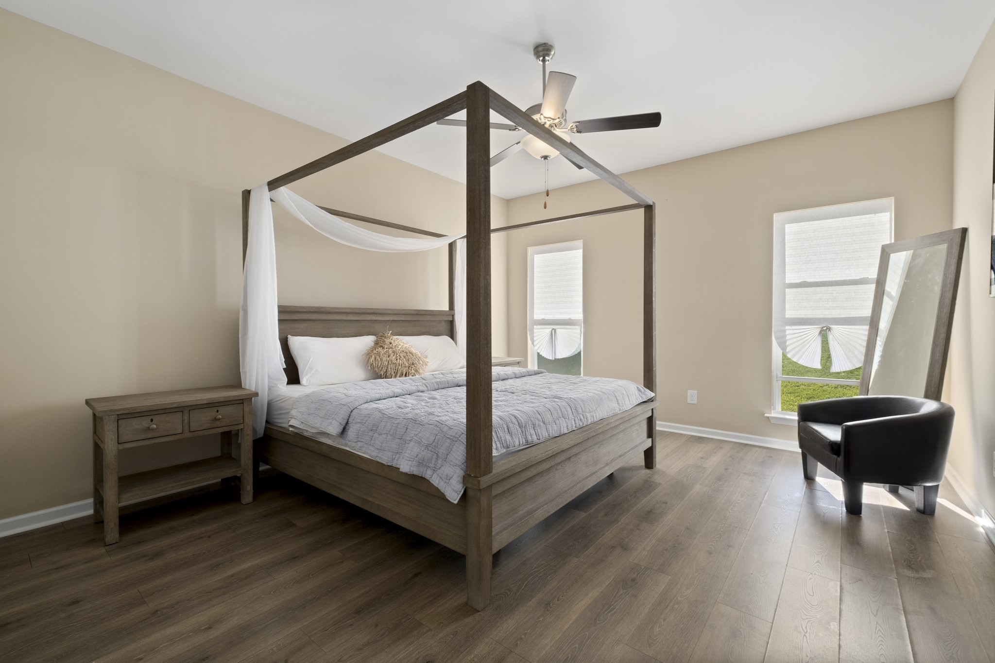 426 Butler Road Mount Juliet, TN 37122 - Photo 18 of 41 a bedroom with a bed and wooden floor