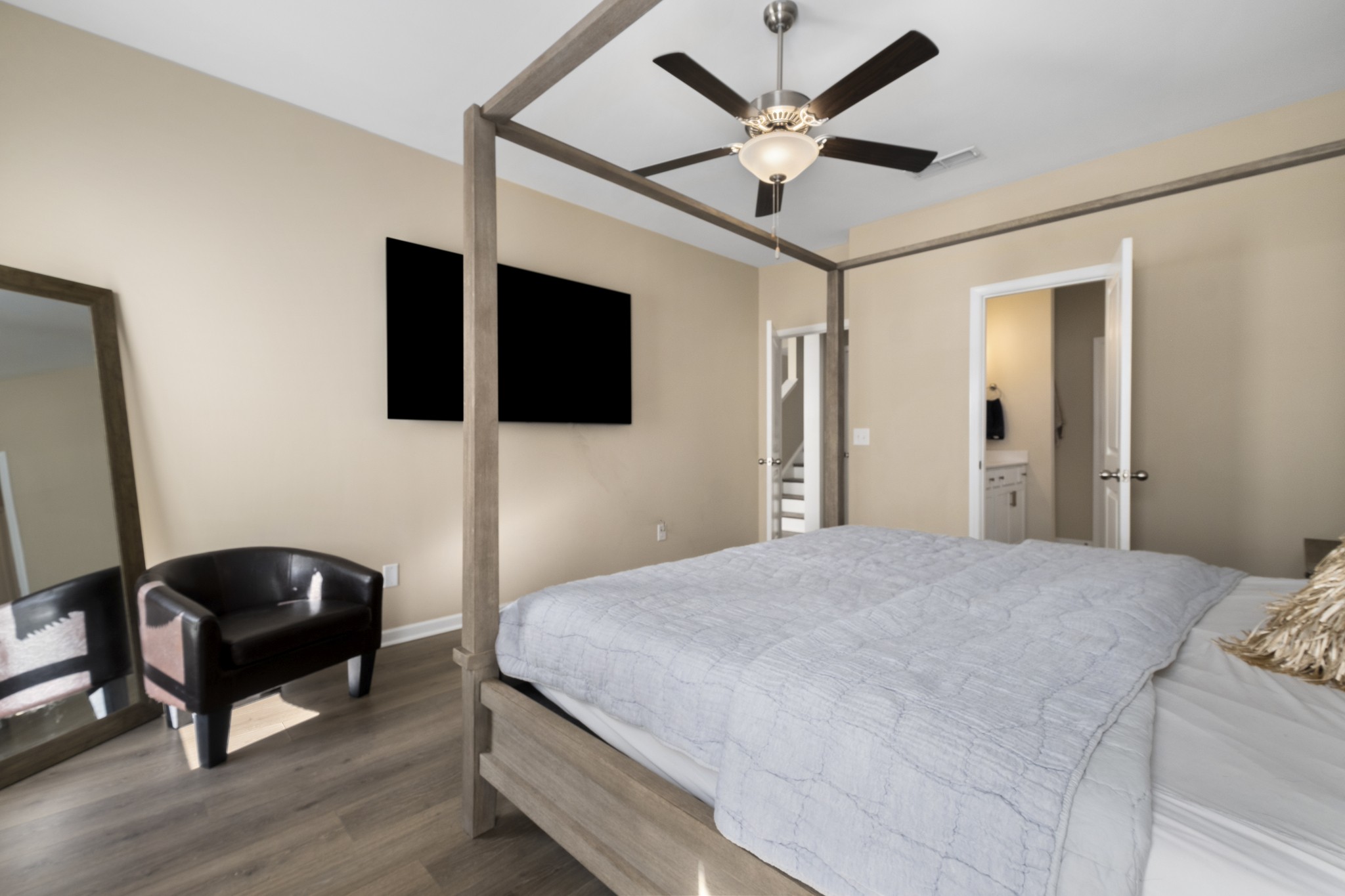 426 Butler Road Mount Juliet, TN 37122 - Photo 19 of 41 a bedroom with a bed a flat screen tv and a chair