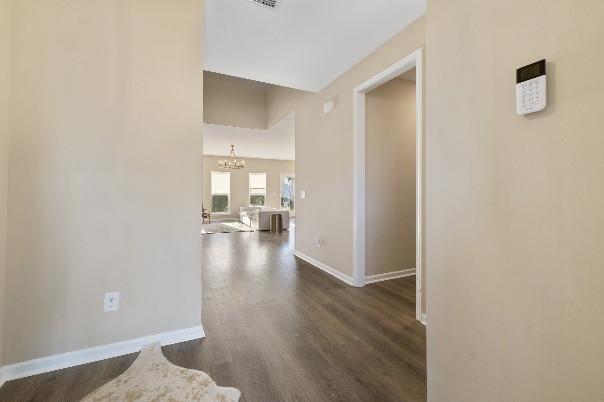 426 Butler Road Mount Juliet, TN 37122 - Photo 8 of 41 a view of a hallway with wooden floor and a cabinet