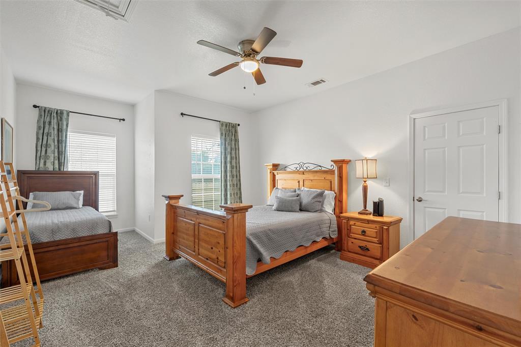 1200 North 15th Street Waco, TX 76707 - Photo 12 of 19 a bedroom with two beds and window