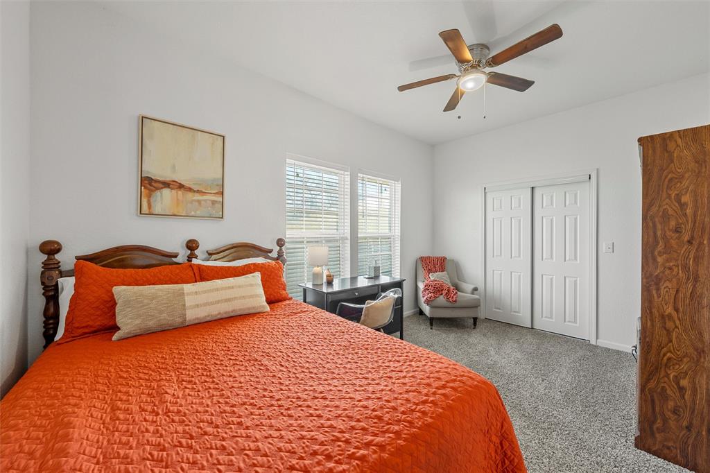 1200 North 15th Street Waco, TX 76707 - Photo 13 of 19 a bedroom with a bed and a large window