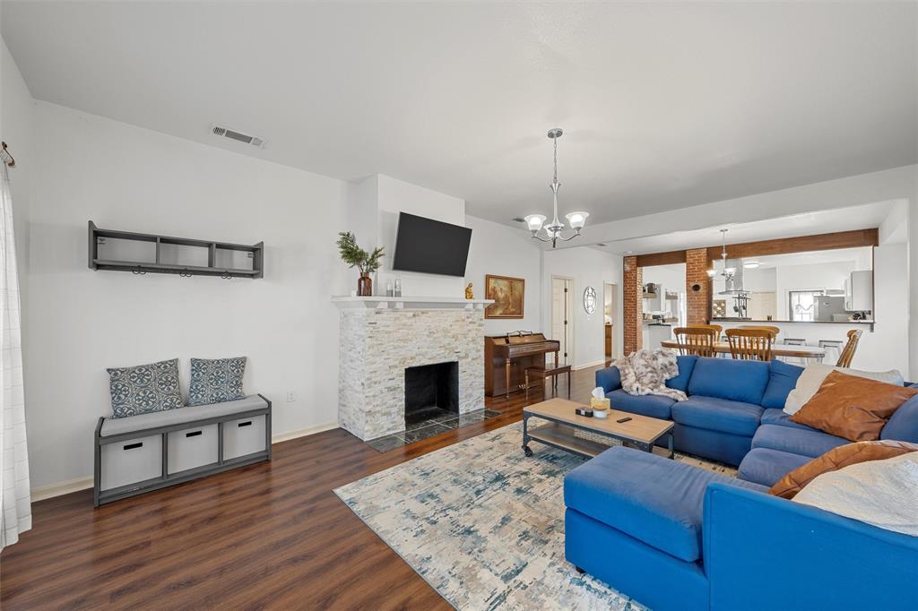 1200 North 15th Street Waco, TX 76707 - Photo 5 of 19 a living room with furniture fireplace and flat screen tv