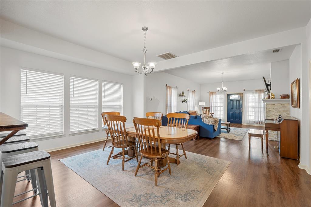 1200 North 15th Street Waco, TX 76707 - Photo 7 of 19 a view of a dining room with furniture window and wooden floor
