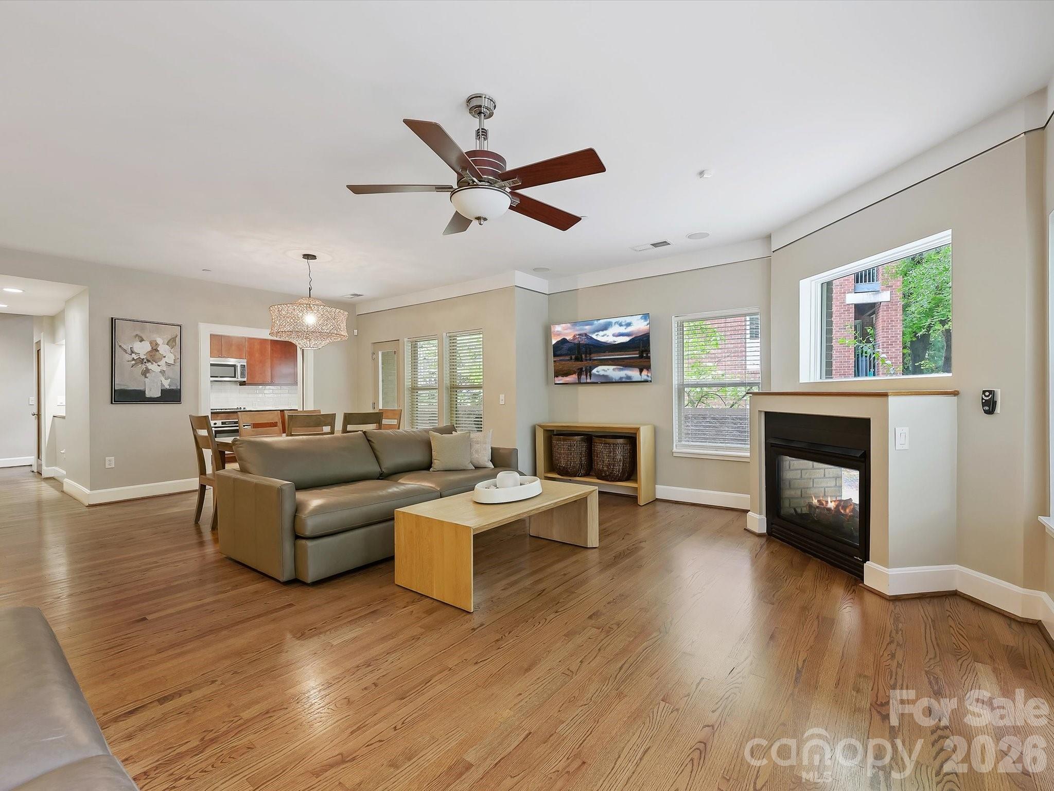 420 Queens Road Charlotte, NC 28207 - Photo 12 of 35 a living room with furniture and a fireplace