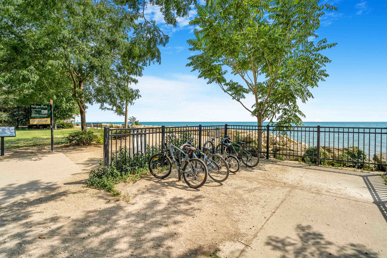 6171 North Sheridan Road, Unit 2804 Chicago, IL 60660 - Photo 9 of 27 a view of a bench with a tree