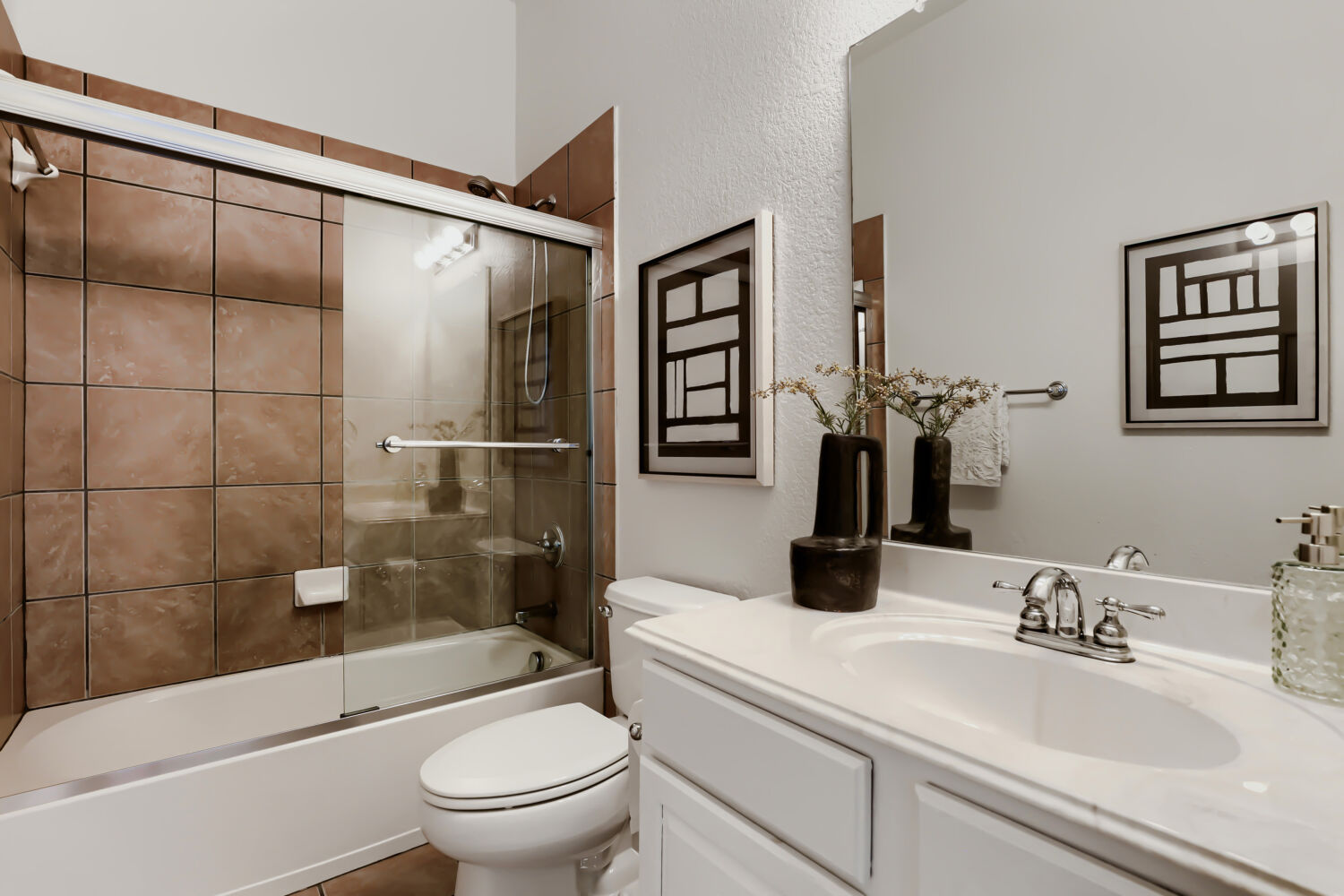 112 Aria Ridge Austin, TX 78738 - Photo 21 of 30 a bathroom with a sink a toilet and shower