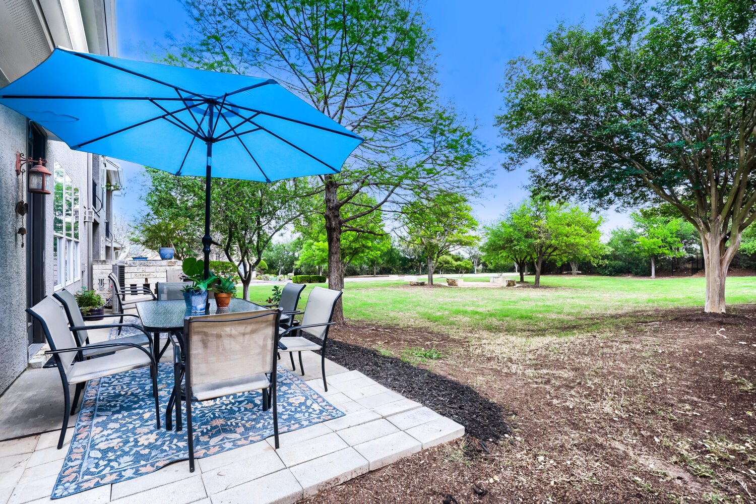 112 Aria Ridge Austin, TX 78738 - Photo 23 of 30 a view of a house with backyard and sitting area