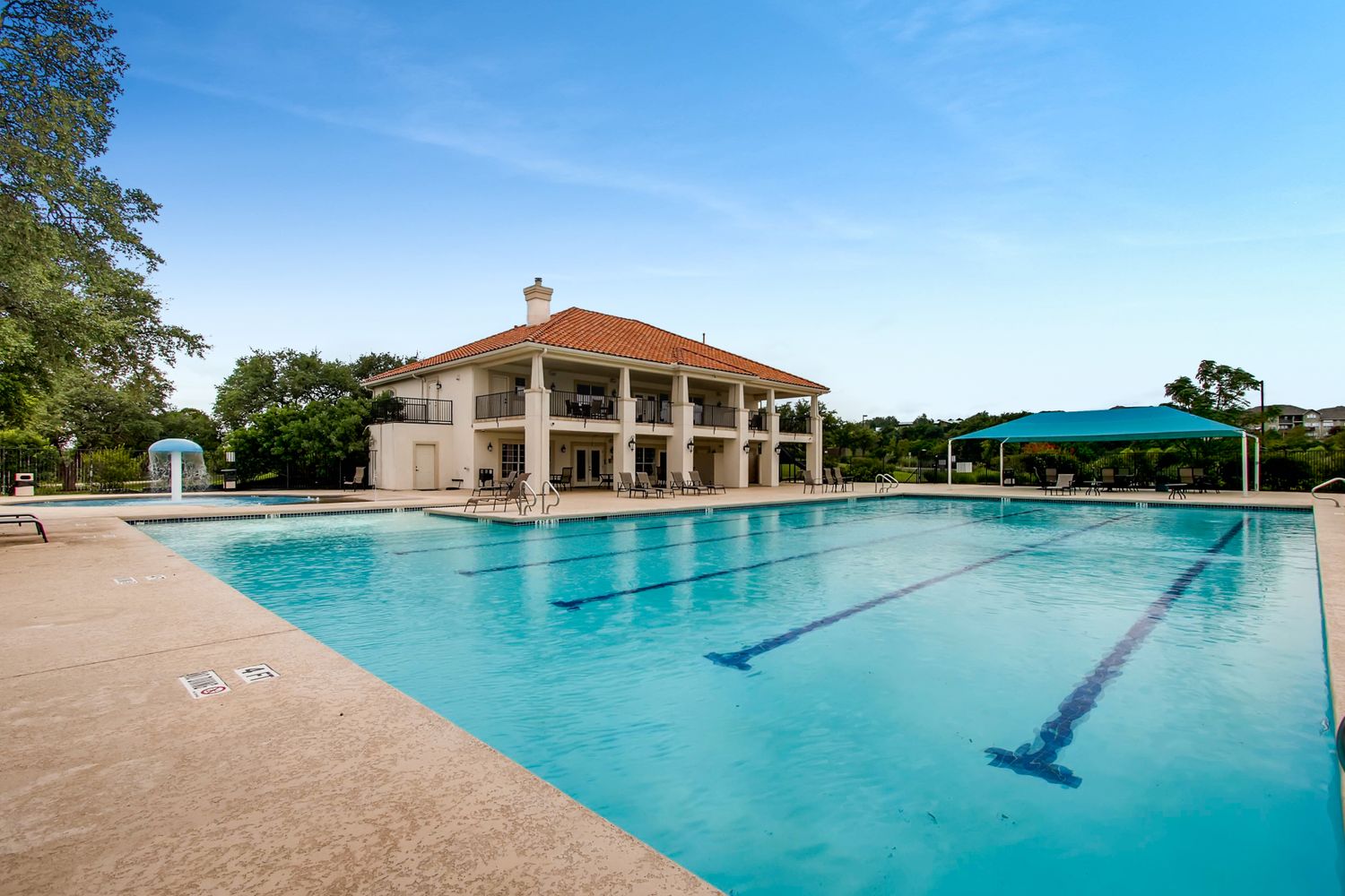 112 Aria Ridge Austin, TX 78738 - Photo 24 of 30 a view of a house with a swimming pool