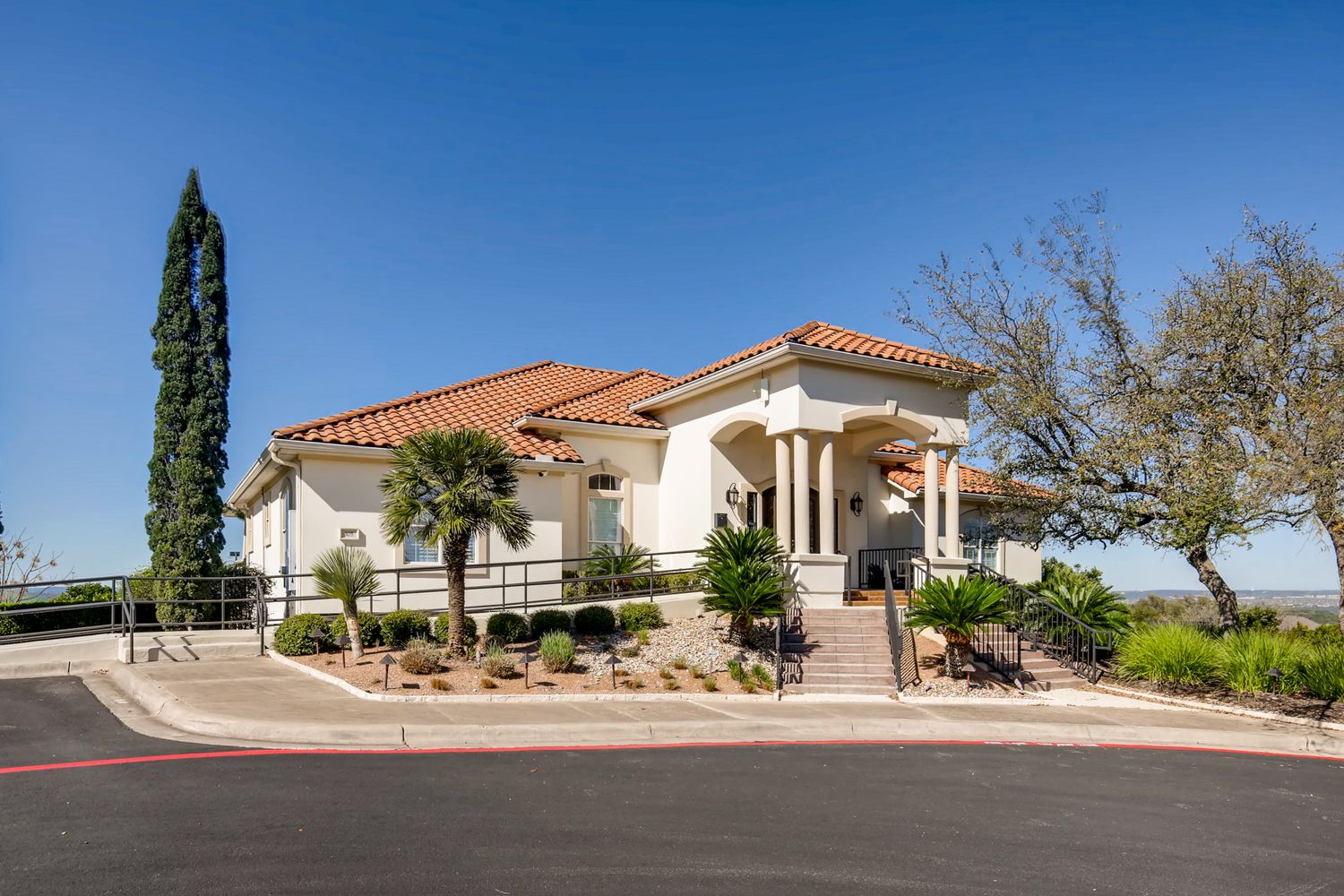 112 Aria Ridge Austin, TX 78738 - Photo 27 of 30 a front view of a house with a yard