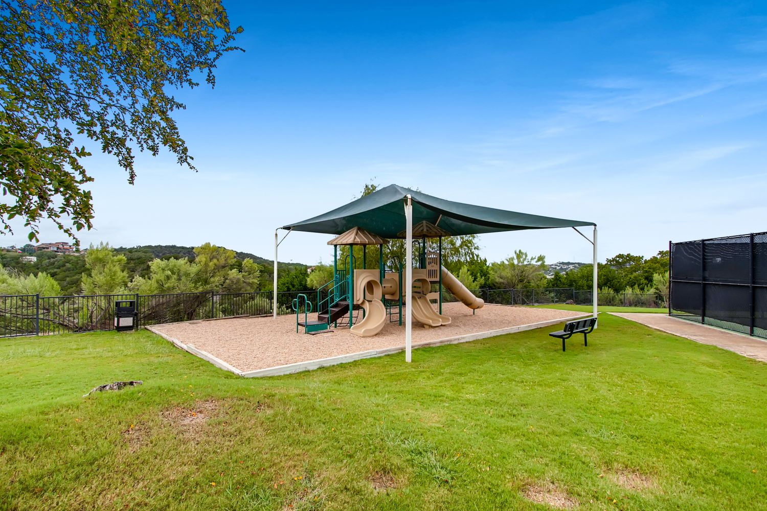 112 Aria Ridge Austin, TX 78738 - Photo 30 of 30 a view of a park with a slide