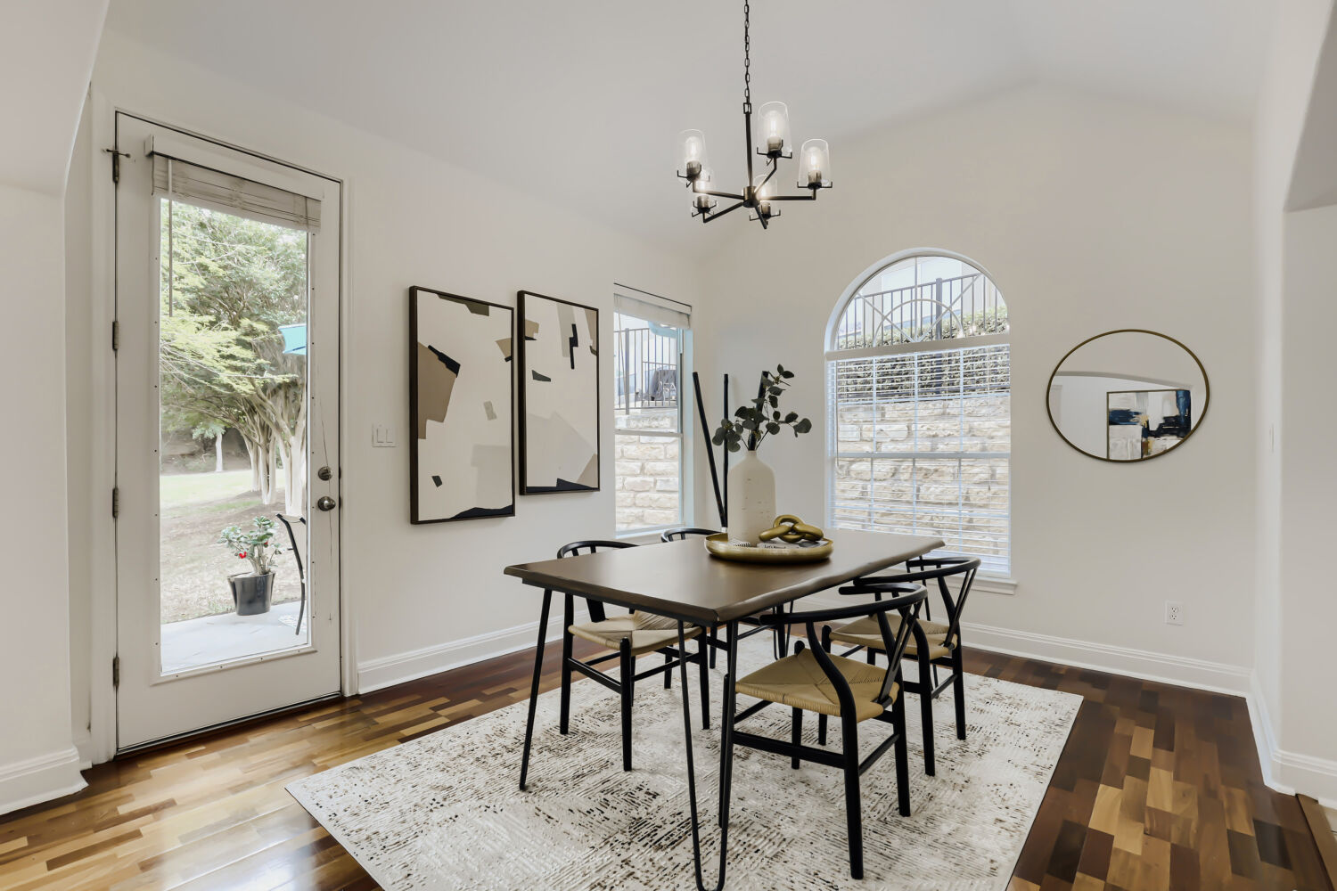 112 Aria Ridge Austin, TX 78738 - Photo 7 of 30 a view of a dining room with furniture window and wooden floor