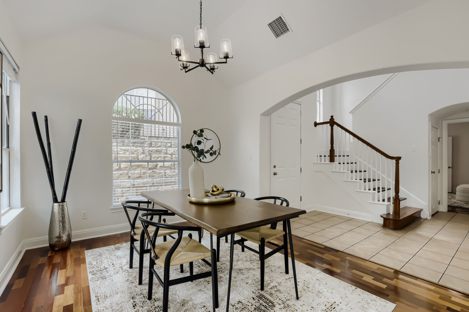 112 Aria Ridge Austin, TX 78738 - Photo 8 of 30 a view of a dining room with furniture and a chandelier