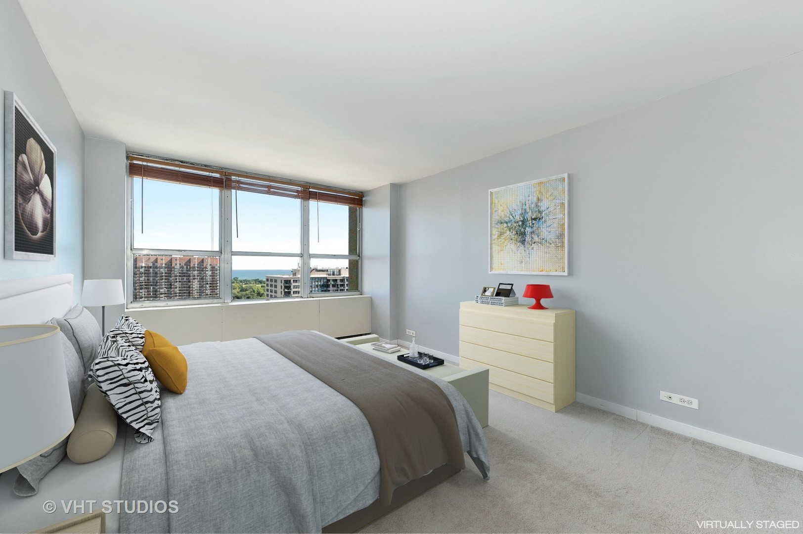 655 West Irving Park Road, Unit 2106 Chicago, IL 60613 - Photo 12 of 15 a bedroom with a bed and a large window
