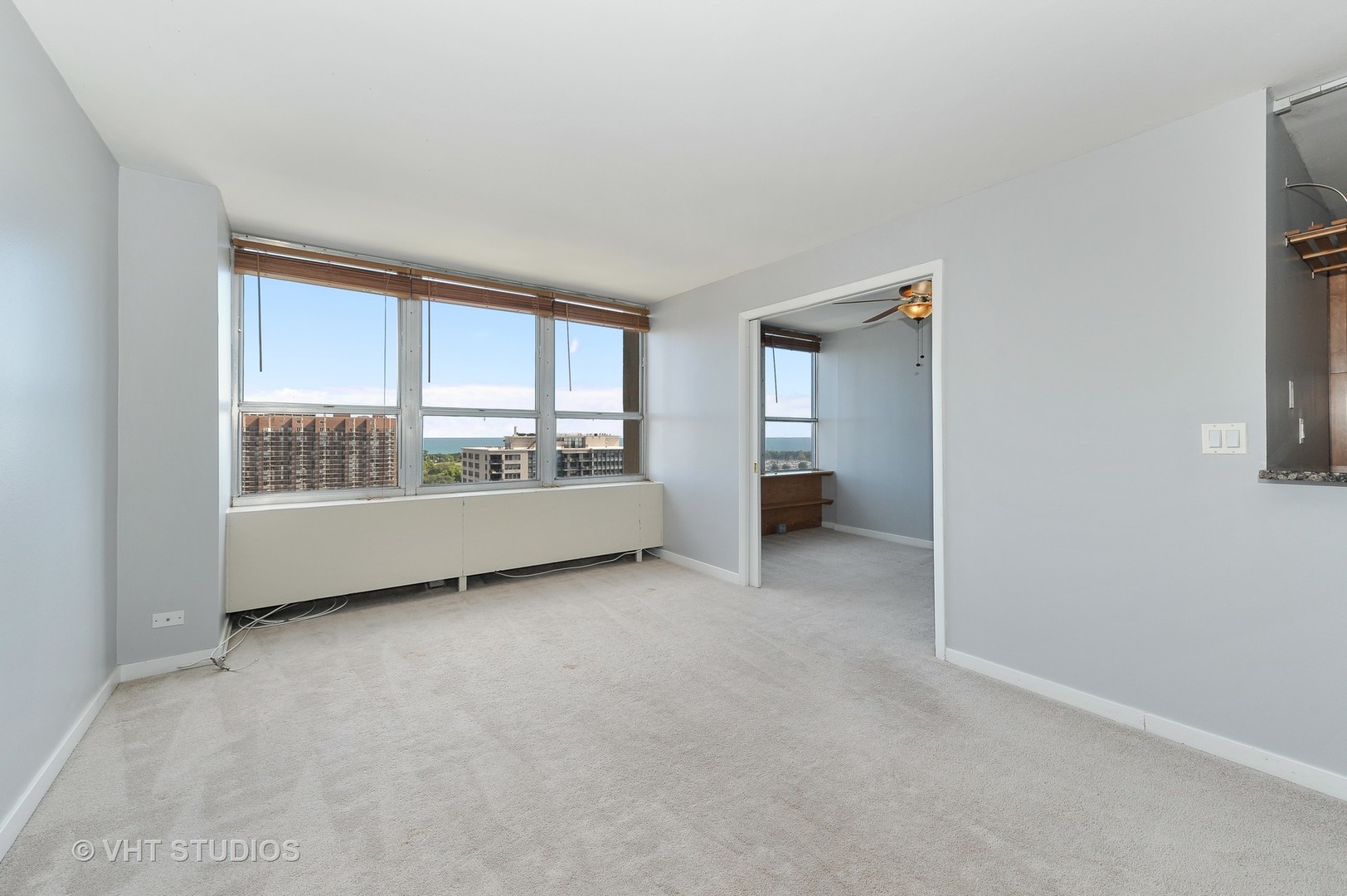 655 West Irving Park Road, Unit 2106 Chicago, IL 60613 - Photo 5 of 15 a view of an empty room with a window