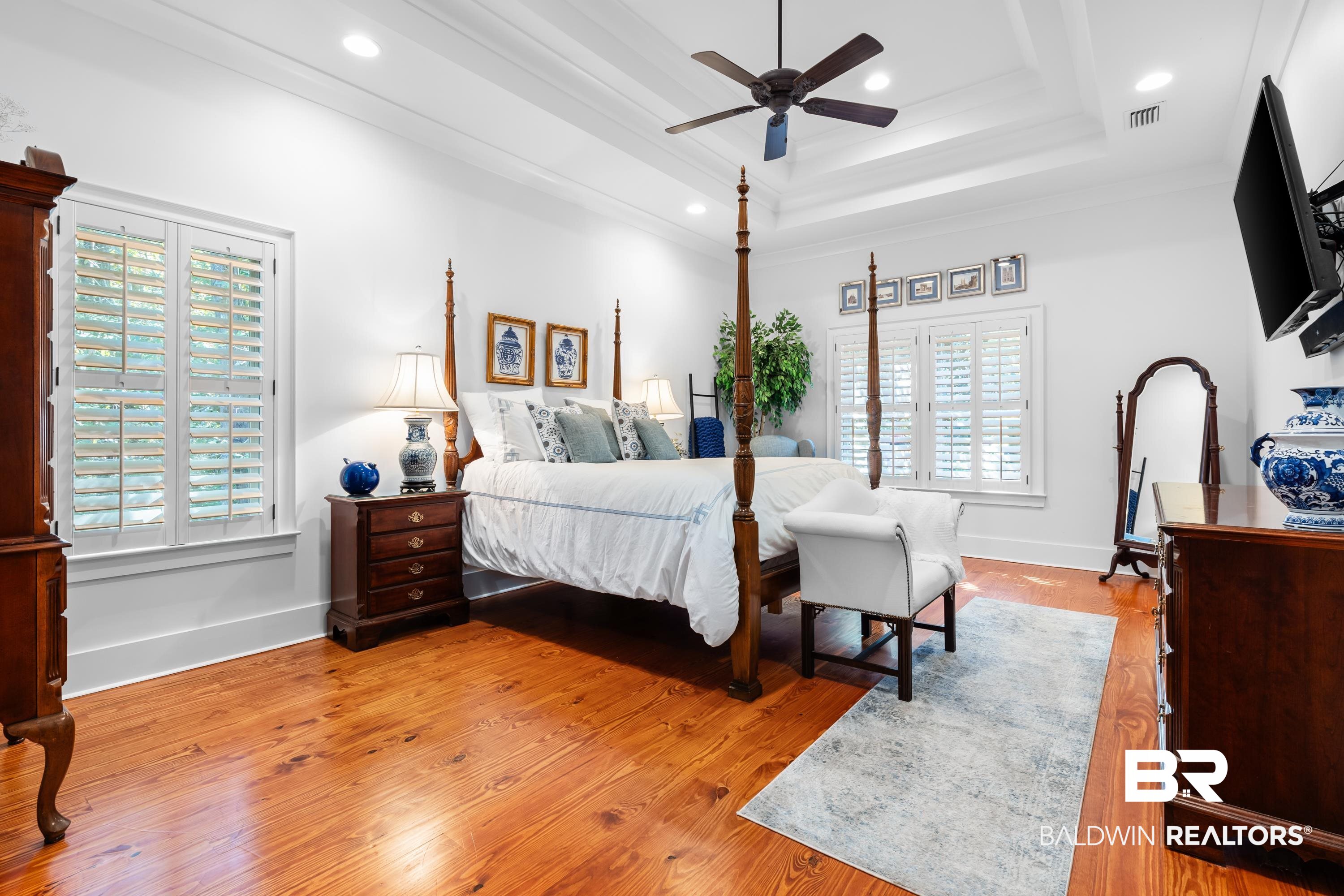 30057 Dolive Ridge Daphne, AL 36527 - Photo 19 of 55 Bedroom featuring ceiling fan, light hardwood / wood-style flooring, and multiple windows