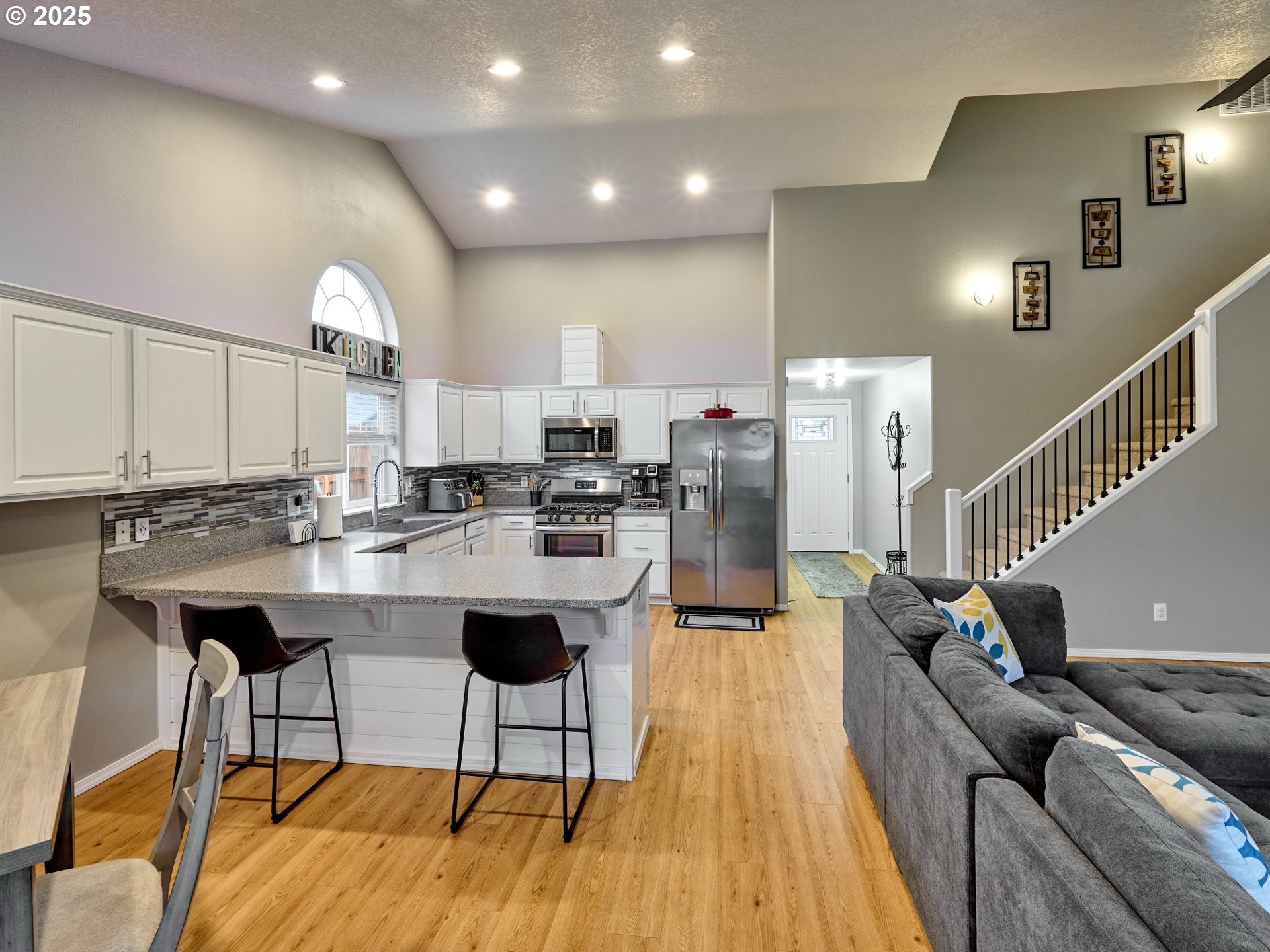 1353 Jodi Drive Silverton, OR 97381 - Photo 13 of 48 a living room with lots of furniture and kitchen view