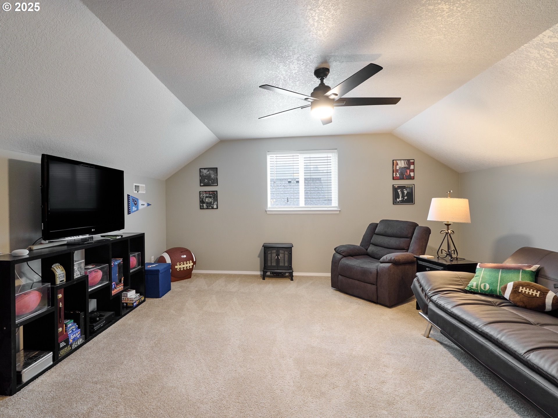 1353 Jodi Drive Silverton, OR 97381 - Photo 25 of 48 a living room with furniture and a flat screen tv
