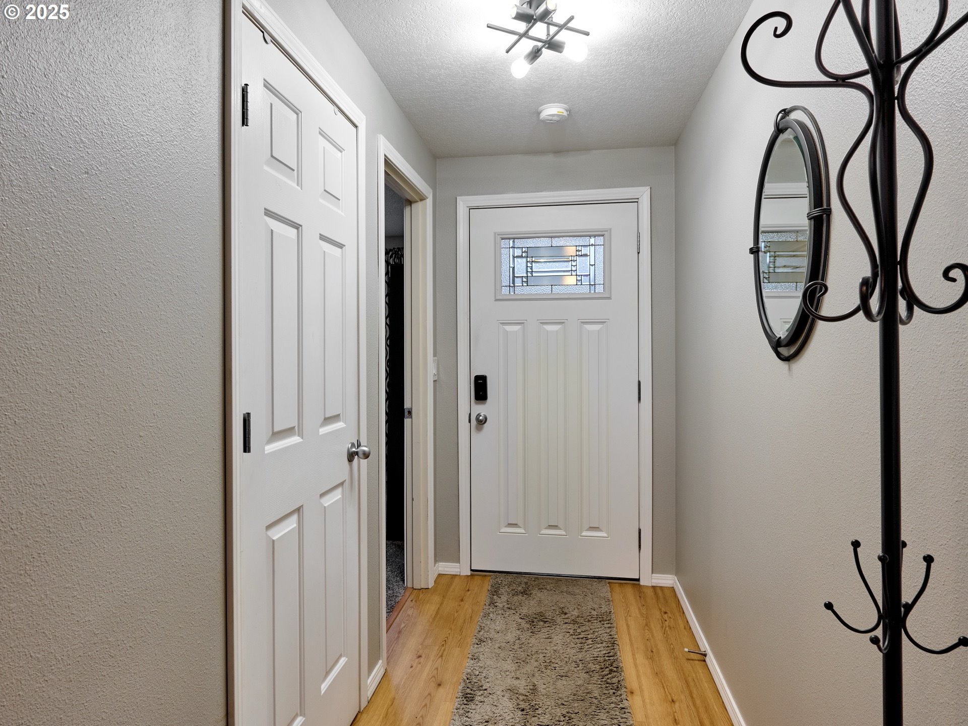 1353 Jodi Drive Silverton, OR 97381 - Photo 5 of 48 a view of a hallway with painted walls