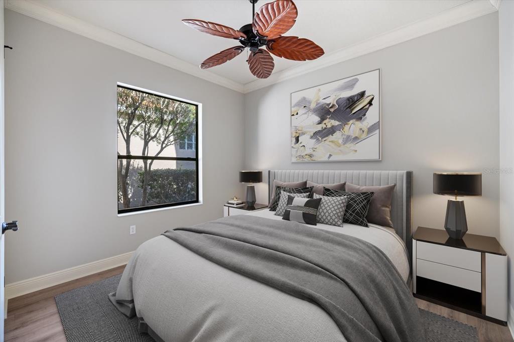 616 Crane Prairie Way Osprey, FL 34229 - Photo 26 of 54 a bedroom with bed and a window